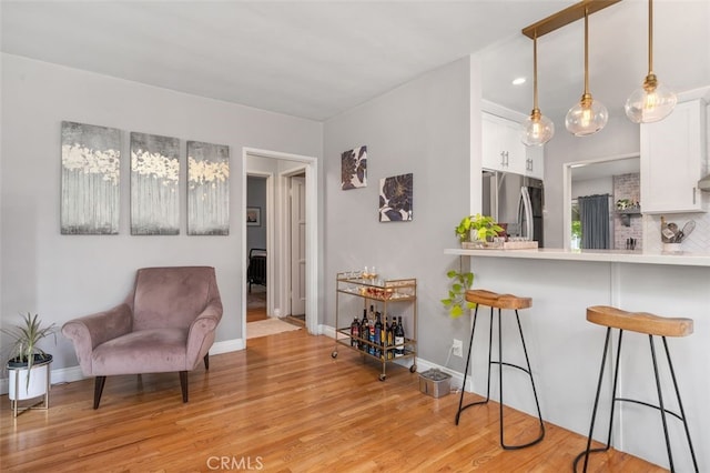 1434 N Rose St, Burbank, CA 91505 - sitting room featuring light wood finished floors and recessed lighting