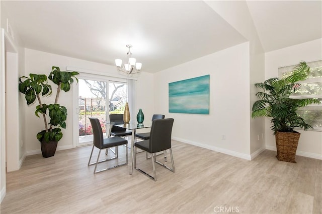 10 Windsong, Irvine, CA 92614 - dining room with a chandelier and light wood-style flooring