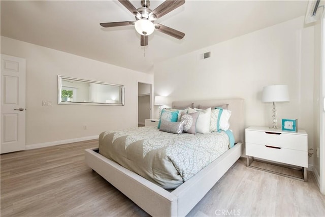 10 Windsong, Irvine, CA 92614 - bedroom featuring light wood-type flooring and ceiling fan
