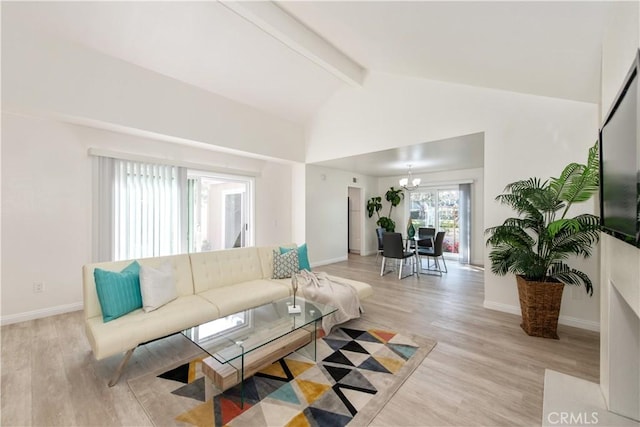 10 Windsong, Irvine, CA 92614 - living room with beam ceiling, a chandelier, light wood-style flooring, and high vaulted ceiling