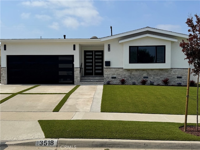3518 W 228th St, Torrance, CA 90505 - view of front facade with driveway, an attached garage, a front yard, and stucco siding