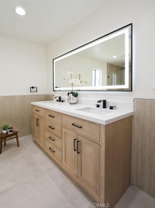 3518 W 228th St, Torrance, CA 90505 - full bathroom featuring double vanity, tile patterned floors, and a wainscoted wall