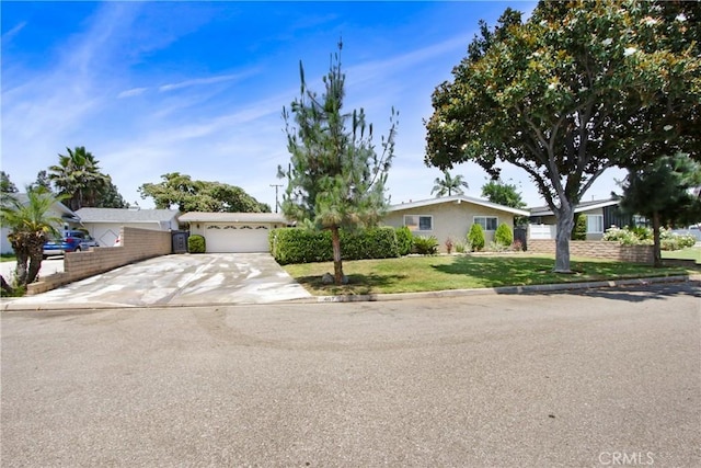 467 W Casad St, Covina, CA 91723 - ranch-style home featuring driveway, a front yard, and an attached garage