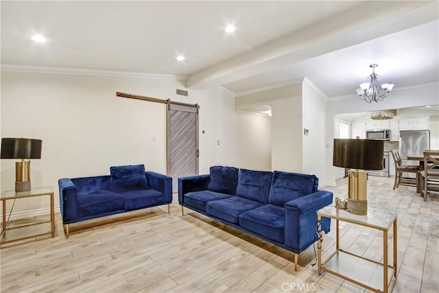 467 W Casad St, Covina, CA 91723 - living room with a barn door, light wood-type flooring, a chandelier, recessed lighting, and crown molding
