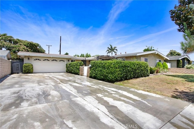 467 W Casad St, Covina, CA 91723 - single story home with stucco siding, driveway, and an attached garage
