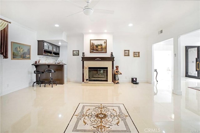 22329 Plummer St, Chatsworth, CA 91311 - tiled living area featuring a ceiling fan, recessed lighting, bar, and a tiled fireplace