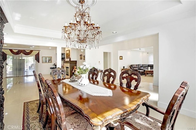 22329 Plummer St, Chatsworth, CA 91311 - tiled dining area featuring a raised ceiling, a chandelier, recessed lighting, and ornamental molding