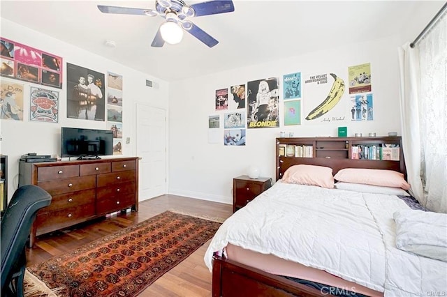 22329 Plummer St, Chatsworth, CA 91311 - bedroom featuring wood finished floors and ceiling fan