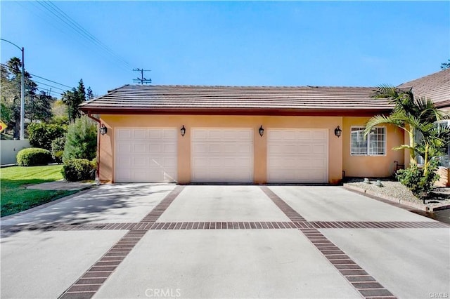 22329 Plummer St, Chatsworth, CA 91311 - view of front facade with stucco siding and driveway