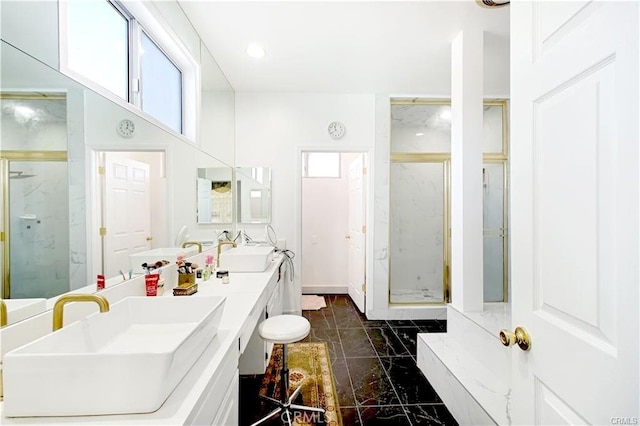 22329 Plummer St, Chatsworth, CA 91311 - bathroom with marble look tiles, a marble finish shower, double vanity, and recessed lighting