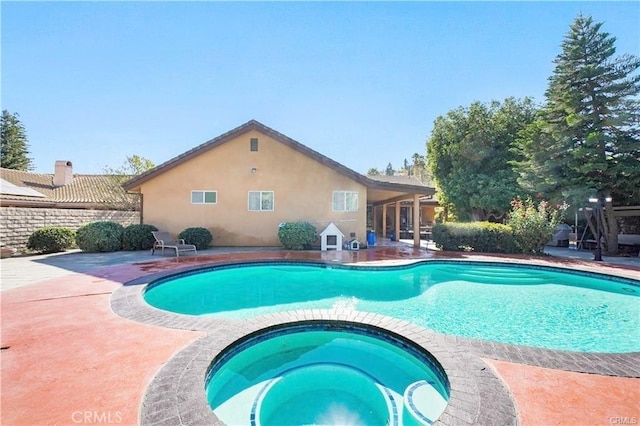22329 Plummer St, Chatsworth, CA 91311 - view of pool featuring a pool with connected hot tub and a patio
