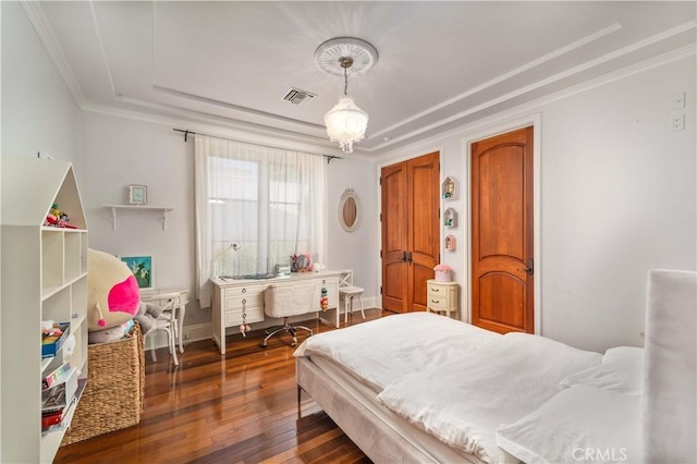 919 S Gretna Green Way, Los Angeles, CA 90049 - bedroom with a tray ceiling, hardwood / wood-style flooring, crown molding, and a chandelier