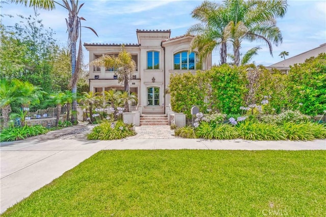919 S Gretna Green Way, Los Angeles, CA 90049 - mediterranean / spanish home featuring stucco siding and a balcony