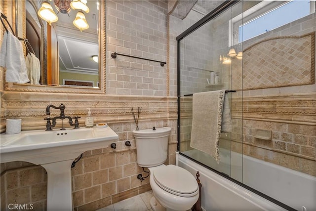 919 S Gretna Green Way, Los Angeles, CA 90049 - bathroom featuring bath / shower combo with glass door and tile walls