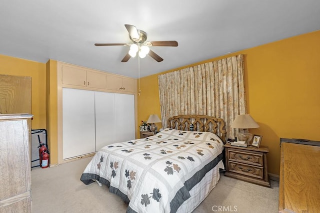 15043 Tuba St, San Fernando, CA 91345 - bedroom with light carpet, a closet, and a ceiling fan
