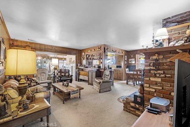 15043 Tuba St, San Fernando, CA 91345 - living room featuring light carpet and wood walls