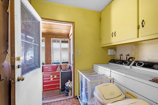 15043 Tuba St, San Fernando, CA 91345 - laundry room featuring washer and clothes dryer and cabinet space