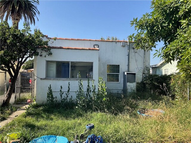 1330 E 56th St, Long Beach, CA 90805 - back of property featuring stucco siding