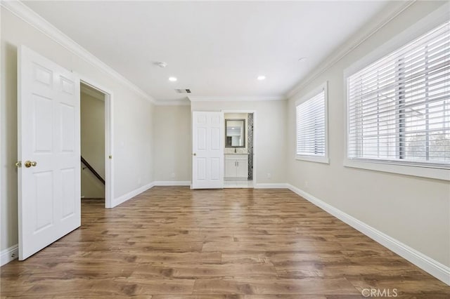 2104 Crenshaw Blvd, Los Angeles, CA 90016 - unfurnished room featuring wood finished floors, ornamental molding, and recessed lighting