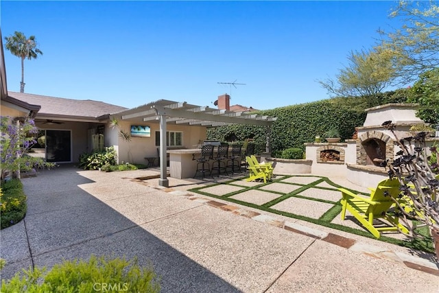 1225 Carlsbad St, Placentia, CA 92870 - view of yard featuring an outdoor stone fireplace, a patio, and a pergola