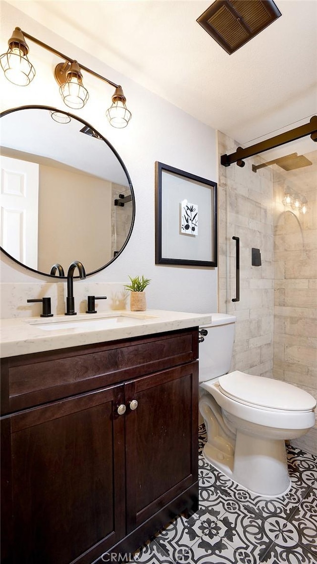 23782 Lagarto, Mission Viejo, CA 92691 - full bath with vanity, tile patterned floors, and a tile shower