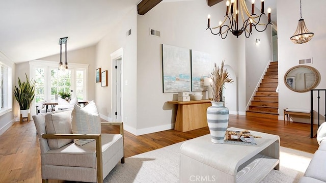 23782 Lagarto, Mission Viejo, CA 92691 - living room with stairway, a chandelier, wood finished floors, and high vaulted ceiling