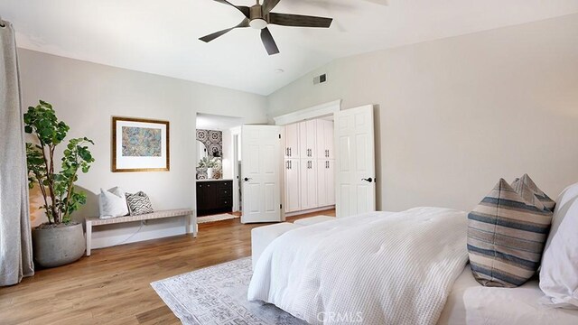 23782 Lagarto, Mission Viejo, CA 92691 - bedroom with lofted ceiling, light wood-type flooring, a ceiling fan, and connected bathroom