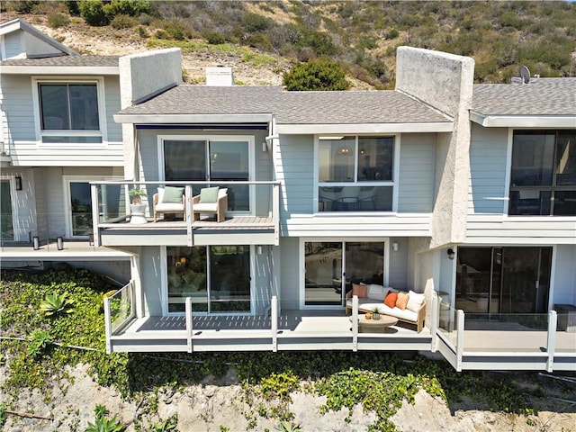 21659 Ocean Vista Dr Unit 20, Laguna Beach, CA 92651 - rear view of property featuring a balcony and a chimney