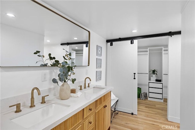 21659 Ocean Vista Dr Unit 20, Laguna Beach, CA 92651 - bathroom with wood finished floors, double vanity, and recessed lighting