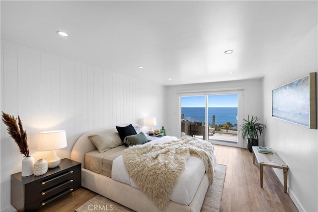 21659 Ocean Vista Dr Unit 20, Laguna Beach, CA 92651 - bedroom with access to outside, wood finished floors, and recessed lighting