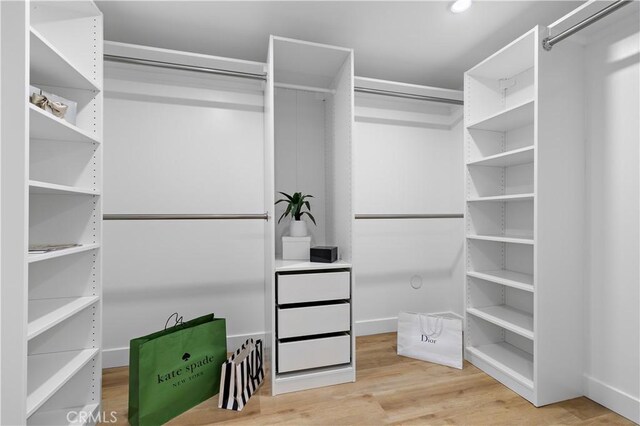 21659 Ocean Vista Dr Unit 20, Laguna Beach, CA 92651 - walk in closet with light wood-type flooring