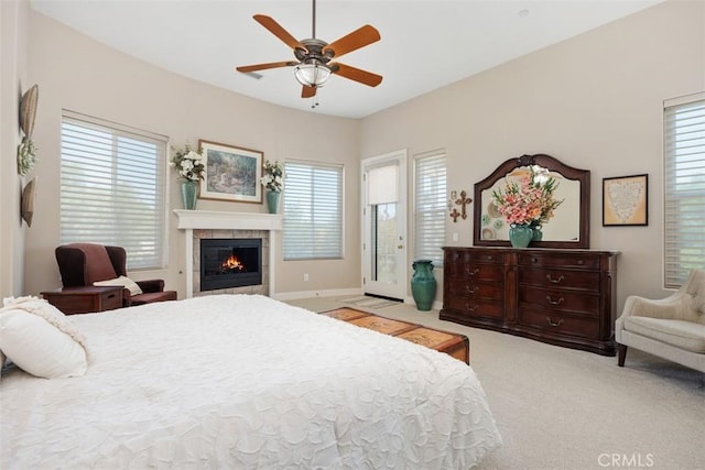2841 Dos Lomas Pl, Fallbrook, CA 92028 - bedroom with carpet flooring, a fireplace, and a ceiling fan