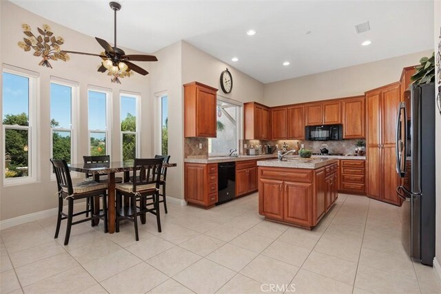 2841 Dos Lomas Pl, Fallbrook, CA 92028 - kitchen featuring black appliances, light countertops, backsplash, ceiling fan, and recessed lighting