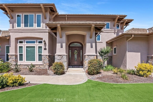 2841 Dos Lomas Pl, Fallbrook, CA 92028 - property entrance featuring stone siding, stucco siding, and a yard