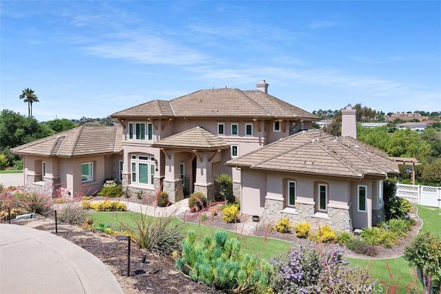 2841 Dos Lomas Pl, Fallbrook, CA 92028 - view of front of property featuring stucco siding, stone siding, and a chimney