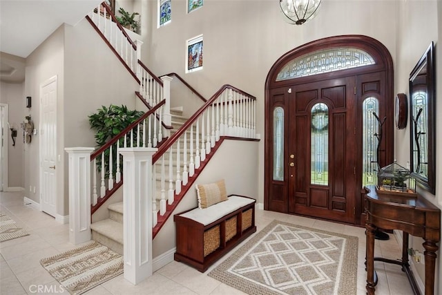 2841 Dos Lomas Pl, Fallbrook, CA 92028 - tiled foyer featuring a towering ceiling, healthy amount of natural light, and stairway