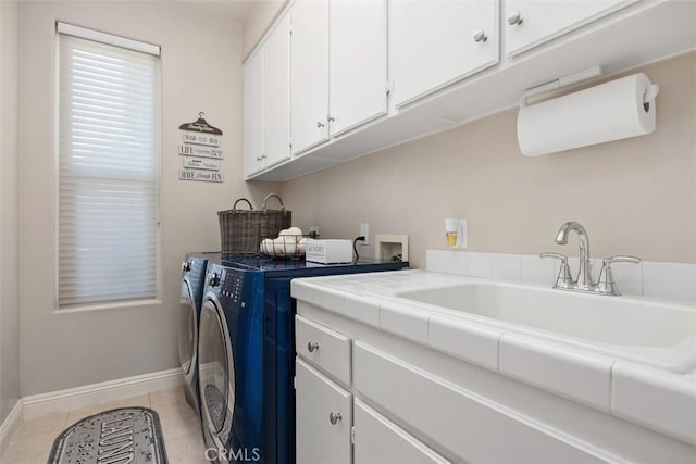 2841 Dos Lomas Pl, Fallbrook, CA 92028 - laundry area with separate washer and dryer, cabinet space, and light tile patterned flooring