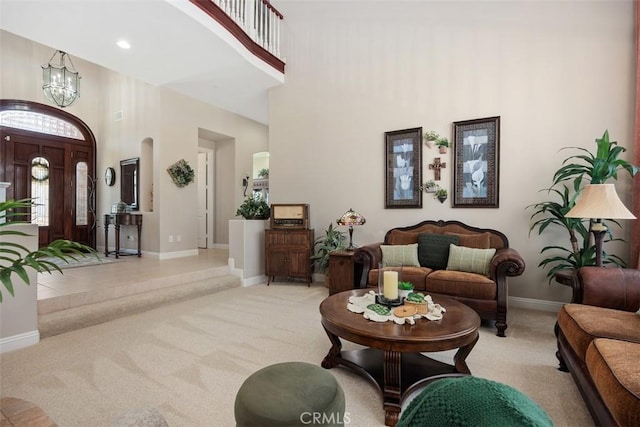 2841 Dos Lomas Pl, Fallbrook, CA 92028 - carpeted living room featuring a high ceiling and a chandelier