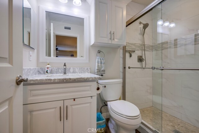 13418 Palm Pl, Cerritos, CA 90703 - bathroom featuring vanity and tiled shower