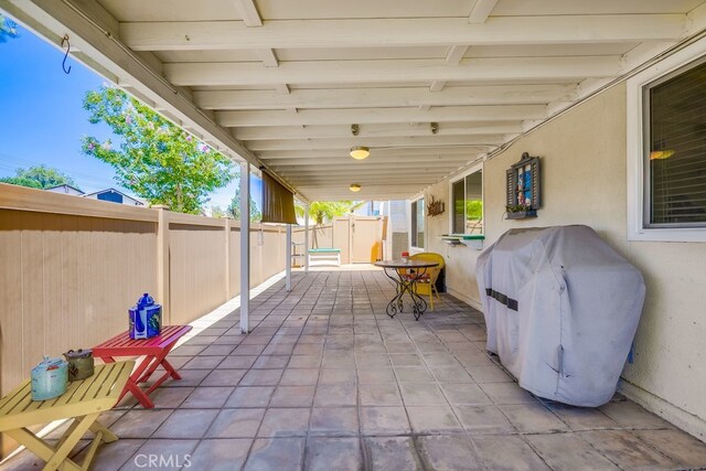 13418 Palm Pl, Cerritos, CA 90703 - fenced backyard featuring a grill and a patio