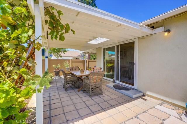 13418 Palm Pl, Cerritos, CA 90703 - view of patio with outdoor dining area