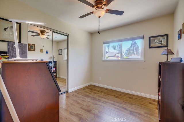 13418 Palm Pl, Cerritos, CA 90703 - unfurnished bedroom with light wood-style floors and ceiling fan