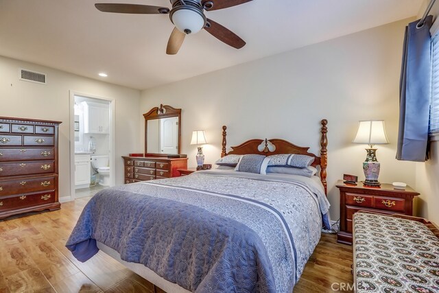 13418 Palm Pl, Cerritos, CA 90703 - bedroom with light wood finished floors, recessed lighting, ensuite bath, and a ceiling fan