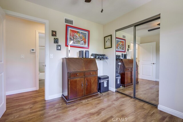 13418 Palm Pl, Cerritos, CA 90703 - bedroom featuring light wood finished floors, a closet, and ceiling fan