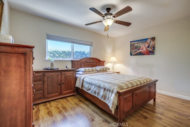 13418 Palm Pl, Cerritos, CA 90703 - bedroom featuring light wood-type flooring and a ceiling fan