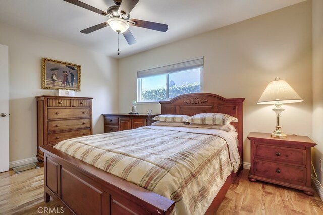 13418 Palm Pl, Cerritos, CA 90703 - bedroom featuring light wood finished floors and baseboards