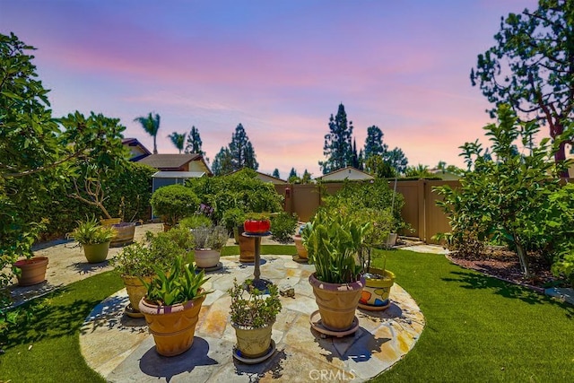 13418 Palm Pl, Cerritos, CA 90703 - fenced backyard featuring a patio area