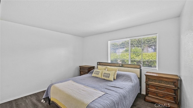 1365 Crafton Ave Unit 1004, Mentone, CA 92359 - bedroom featuring wood finished floors and baseboards