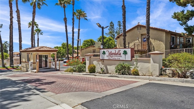 1365 Crafton Ave Unit 1004, Mentone, CA 92359 - community / neighborhood sign featuring a residential view