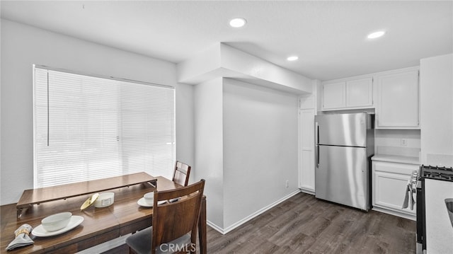 1365 Crafton Ave Unit 1004, Mentone, CA 92359 - kitchen featuring stainless steel appliances, white cabinets, dark wood-style flooring, light countertops, and recessed lighting